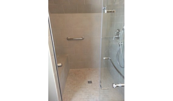 Custom shower in a heritage home, Charlottetown. Sloped ceiling in the shower.